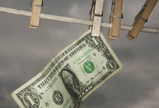What is a pegged currency and how does it work?